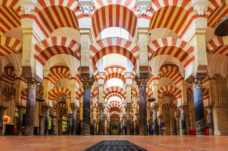 The golden mosaic mihrab prayer niche on a mosque cathedral of cordoba tour in Córdoba, Spain
